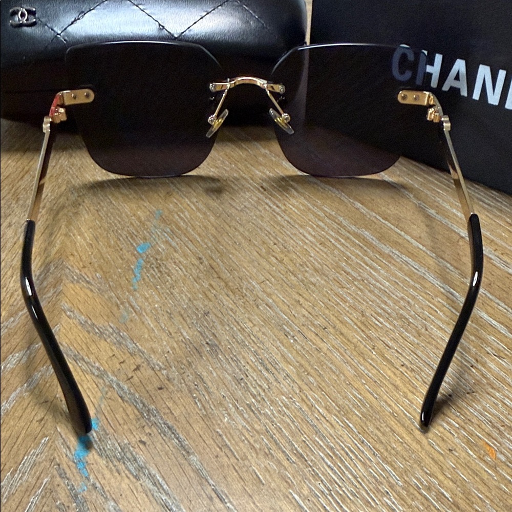 CHANEL Rimless Square Sunglasses in Black with Gold Details - Picture 6 of 7